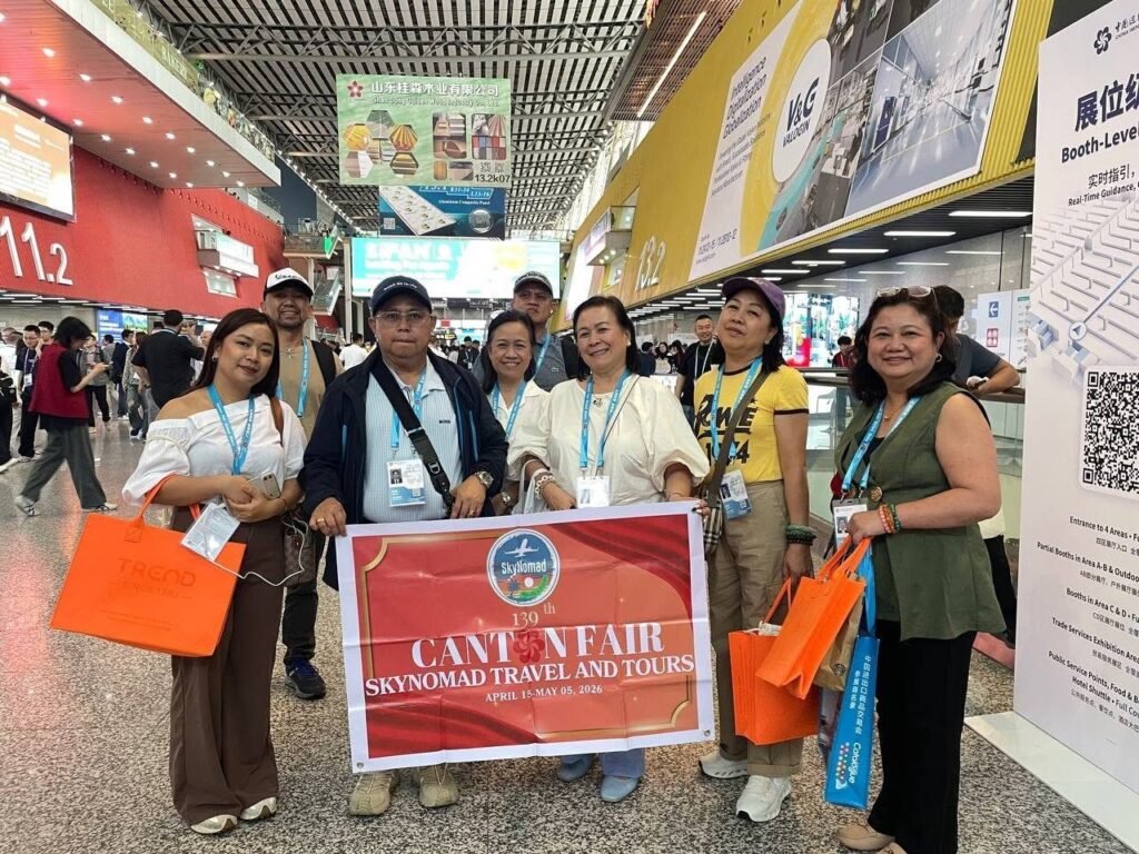 SkyNomad clients holding the company banner at the 139th Canton Fair in Guangzhou, China