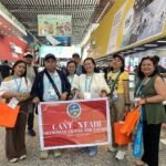 SkyNomad clients holding the company banner at the 139th Canton Fair in Guangzhou, China